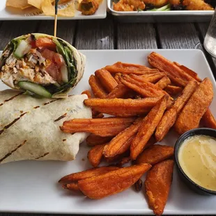Veggie wrap +added blackened Mahi  Sweet potato fries
