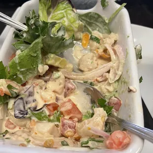 This ceviche appetizer looked creamy so I wasn't sure. It was delicious and homemade chips were great.  Ceviche