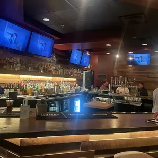 people sitting at the bar