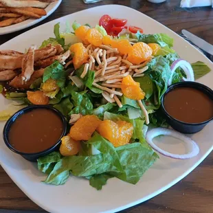 Mandarin Chicken Salad - with grilled chicken, crispy look mein noodles, fresh Mandarin slices and a delicious sesame dressing!