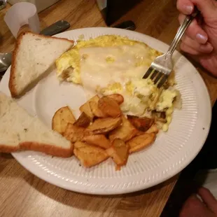 Wife&apos;s Eggs, Potato&apos;s, and GF toast.  Just nice to have a place that has GF.