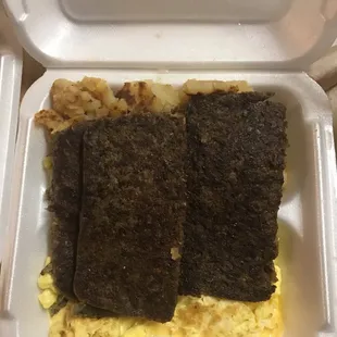 a meal in a styrofoam container