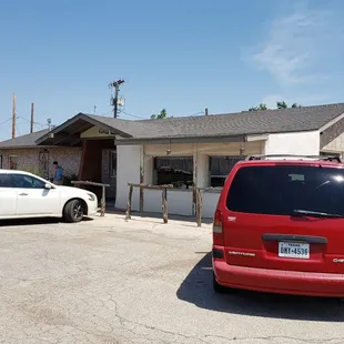 On the north side of the road