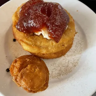 Fried biscuit with strawberry jam.