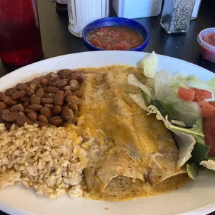 Chicken enchiladas, homemade beans fresh salad. Delicious, along with the sweet tea. Service was super friendly and expeditious .