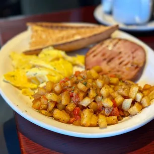 Bug breakfast place with ham. Artisan bread toasted just right - nice and airy bread.