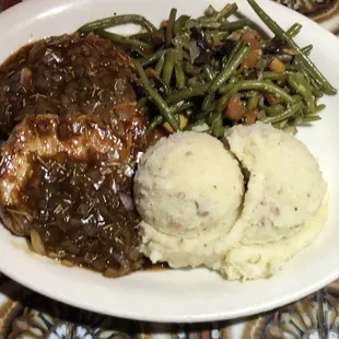 pork, beans, and mashed potatoes