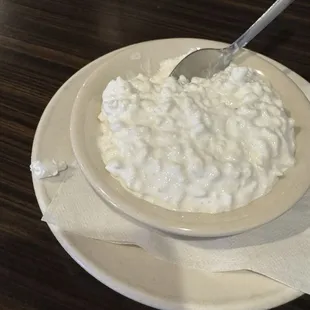 hard plastic piece in cottage cheese