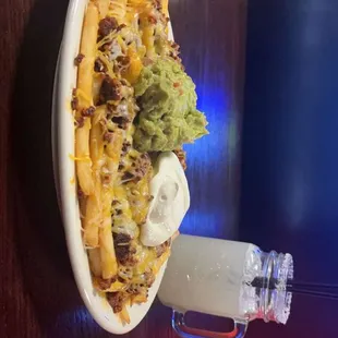 Chili Cheese Fries with chorizo and a  Lime Rita
