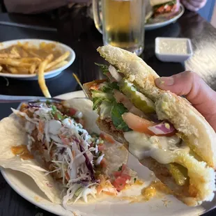 Half of The chicky sandwich &amp; 1 baja fish taco with green Chile fries and an ice cold mug beer!