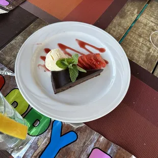 Complimentary birthday dessert. Chocolate fudge pie? Ice cream with sliced strawberries