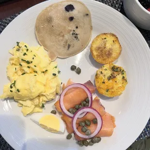 Scrambled eggs, blueberry pancakes, hard boiled egg, lox and capers/onions, and frittatas.