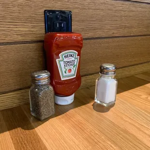 ketchup, salt and pepper shakers