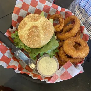 Chicken fried chicken sandwich with onion rings