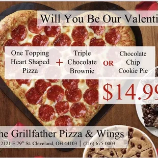 a heart shaped pizza with toppings