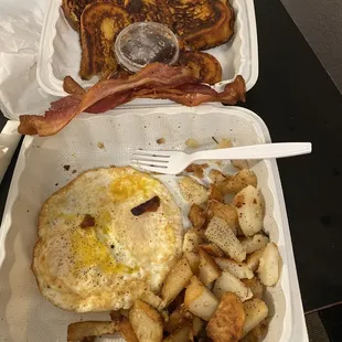 Eggs, bacon, French Toast and country potatoes
