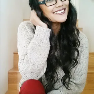 Kimberly E.