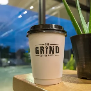 a cup of coffee on a table