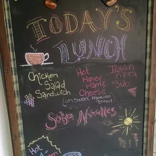 a chalk board with a menu on it