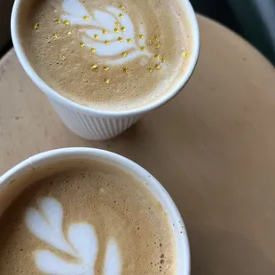 two cups of coffee on a table