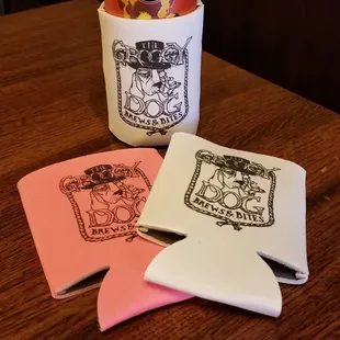 a can of beer and coasters
