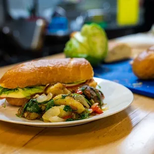 a sandwich on a plate on a table