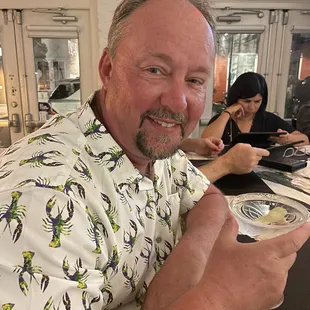 Crawfish aloha shirt I got here - he loved it!