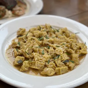 a plate of pasta on a table