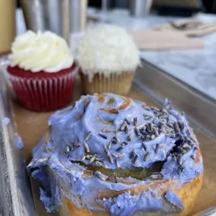 Baked goods (lavender morning bun, red velvet cupcake, coconut cupcake)