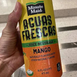 a can of mango juice