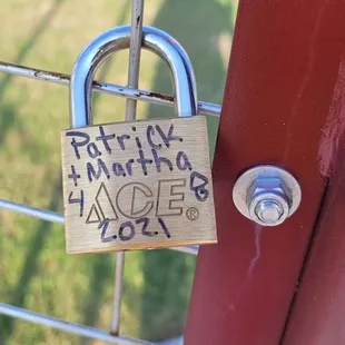 a padlock attached to a gate