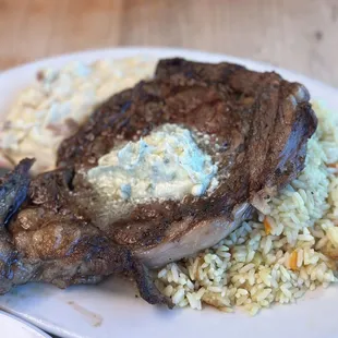 Porter house steak, garlic mashed potatoes and rice pilaf