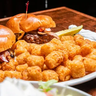 a burger and tater tots