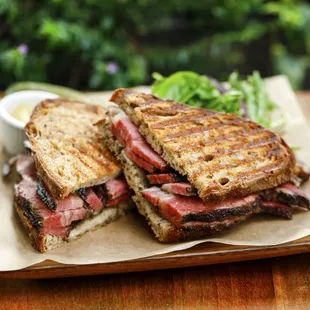 Homemade, succulent pastrami with mustard on the side - the best outside of the East Coast!