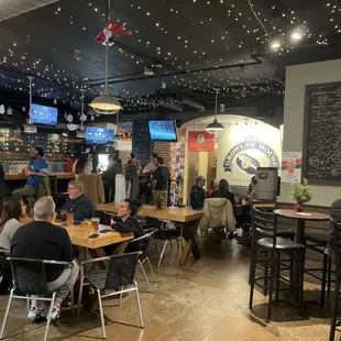 a large group of people sitting at tables