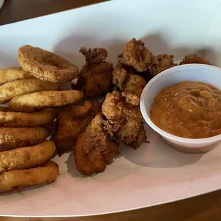 Chicken bites and onion rings with their famous grub sauce
