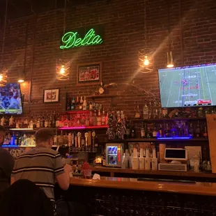 a man sitting at the bar
