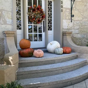 in the back  or opposite side of the house where outside eating area is