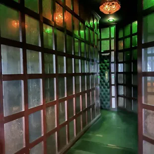 a long hallway with glass walls