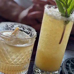 two cocktails on a table