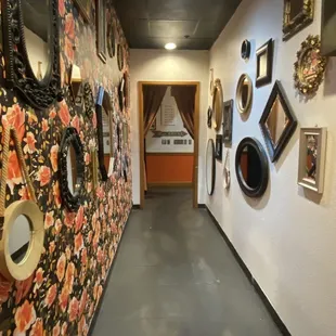 Funky hallway to funky restroom