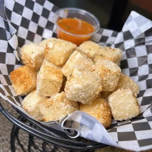 a basket of fried tater tots