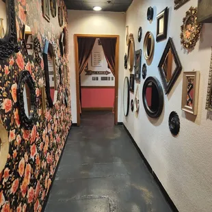 Hall of mirrors one must pass through to get to the bathroom