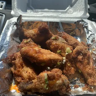 Jumbo fried wings with bourbon Buffalo drizzle