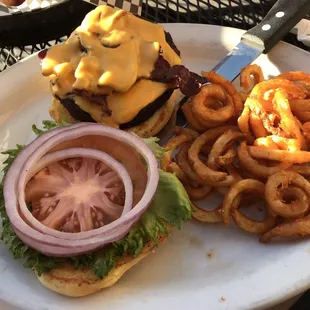 All-American burger with curly fries. I had bacon added to mine.
