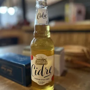 a bottle of cidle on a table