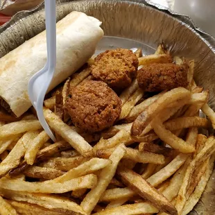 Beef shwarma wrap (ate 1 half already) and order of falafel.