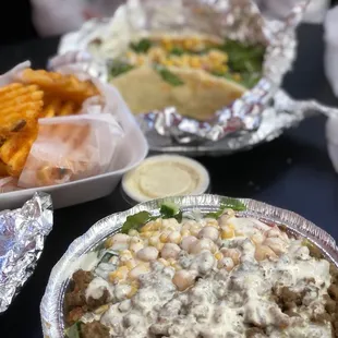 Lamb platter, waffle fries, gyro sandwich w lamb