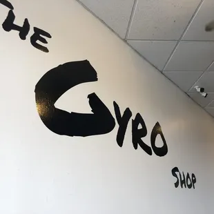 the logo on the wall