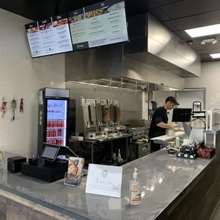 a man preparing food in the kitchen